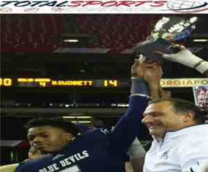 Norcross' Myles Autry and Coach Keith Maloof celebrate their second title 